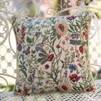 Housse de coussin en tapisserie motifs jardin fleuri.