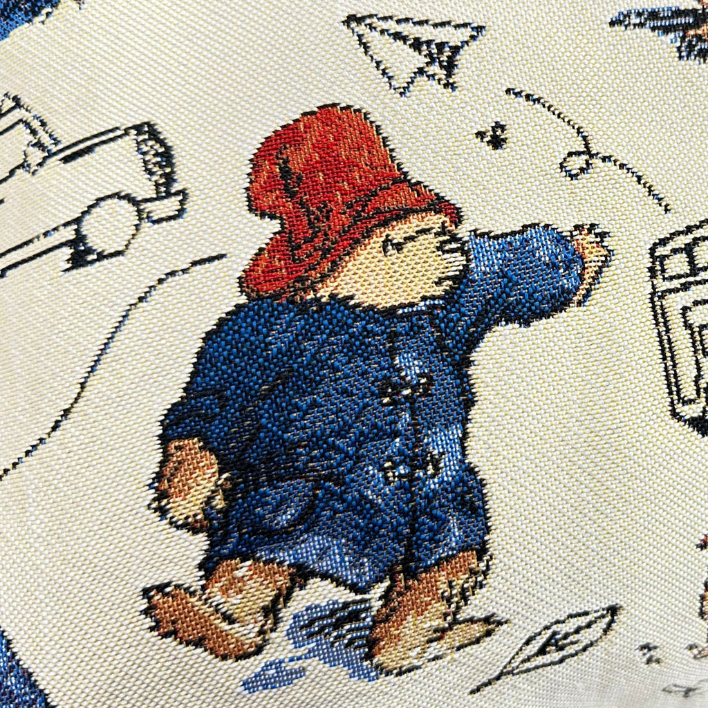 Housse de coussin en tapisserie de haute qualité représentant l'Ours Paddington.
