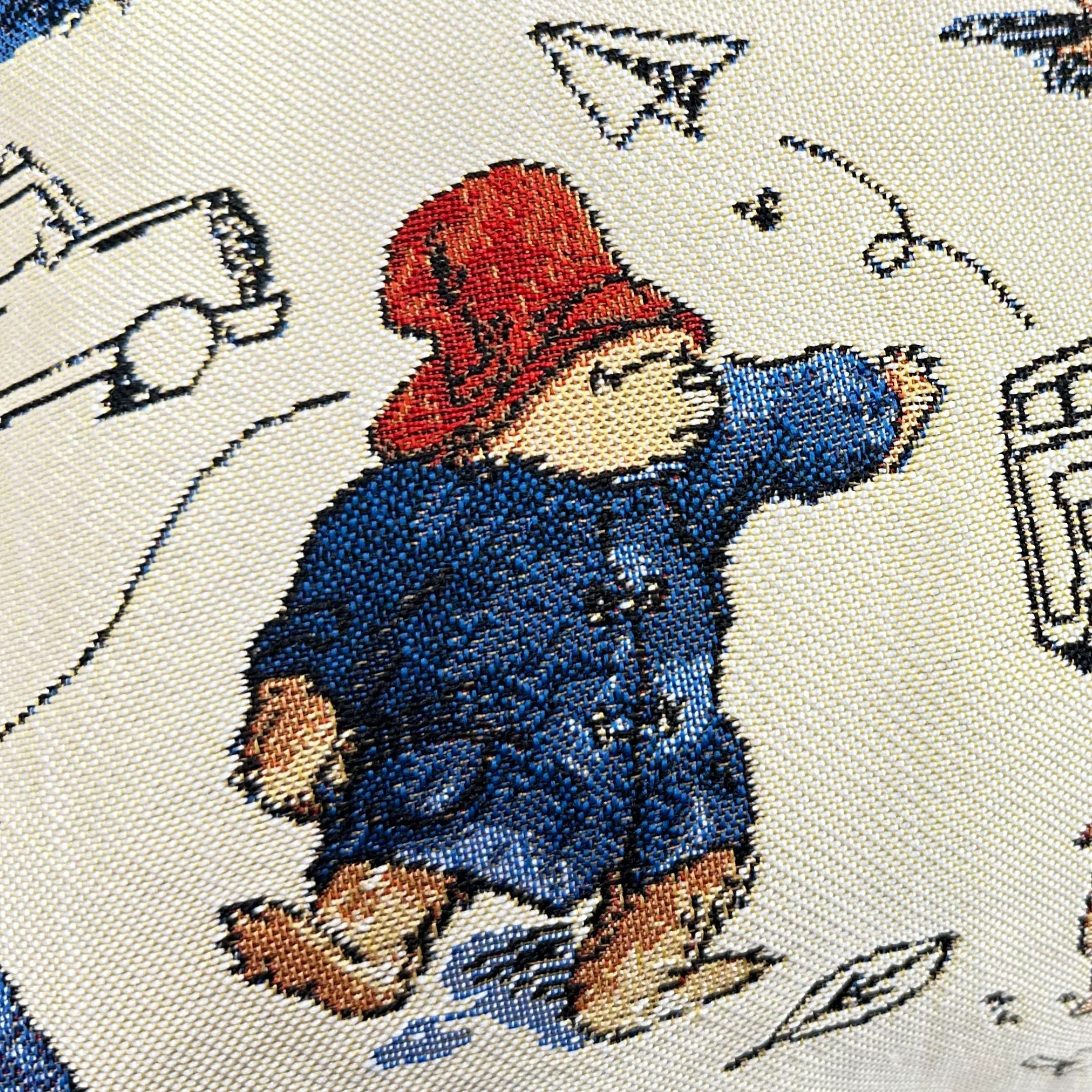 Housse de coussin en tapisserie de haute qualité représentant l'Ours Paddington.