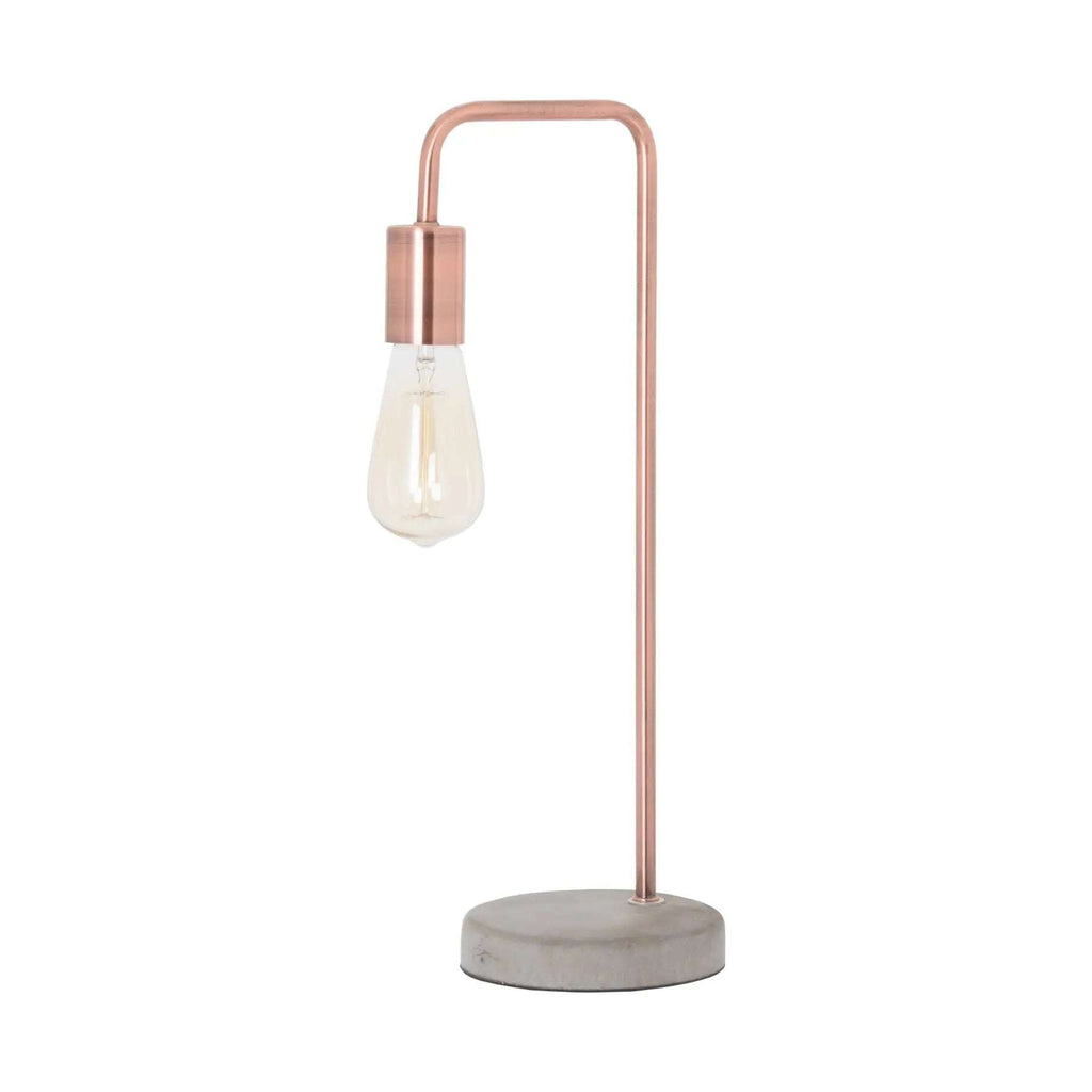 Lampe industrielle en cuivre et pierre.