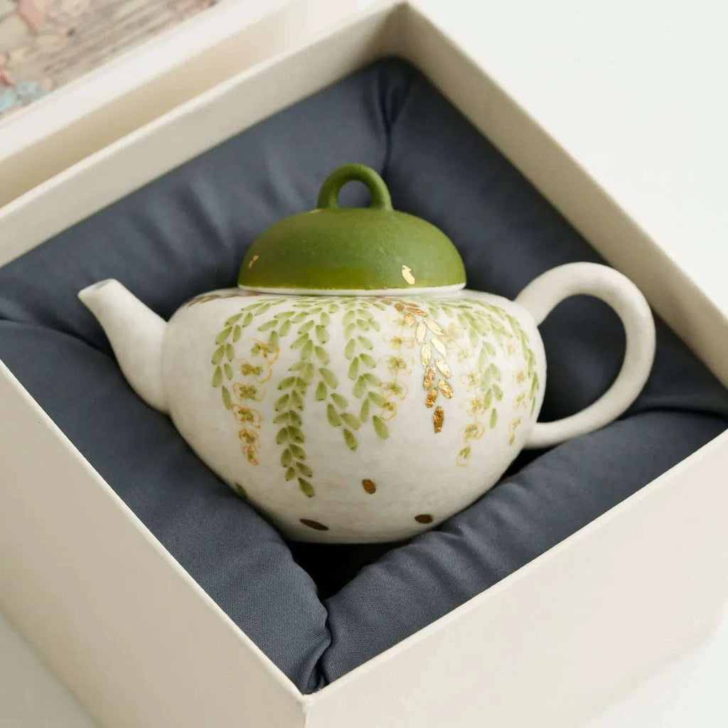 Théière 120ml artisanale en céramique motif feuilles vertes.