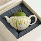 Théière 120ml artisanale en céramique motif feuilles vertes.