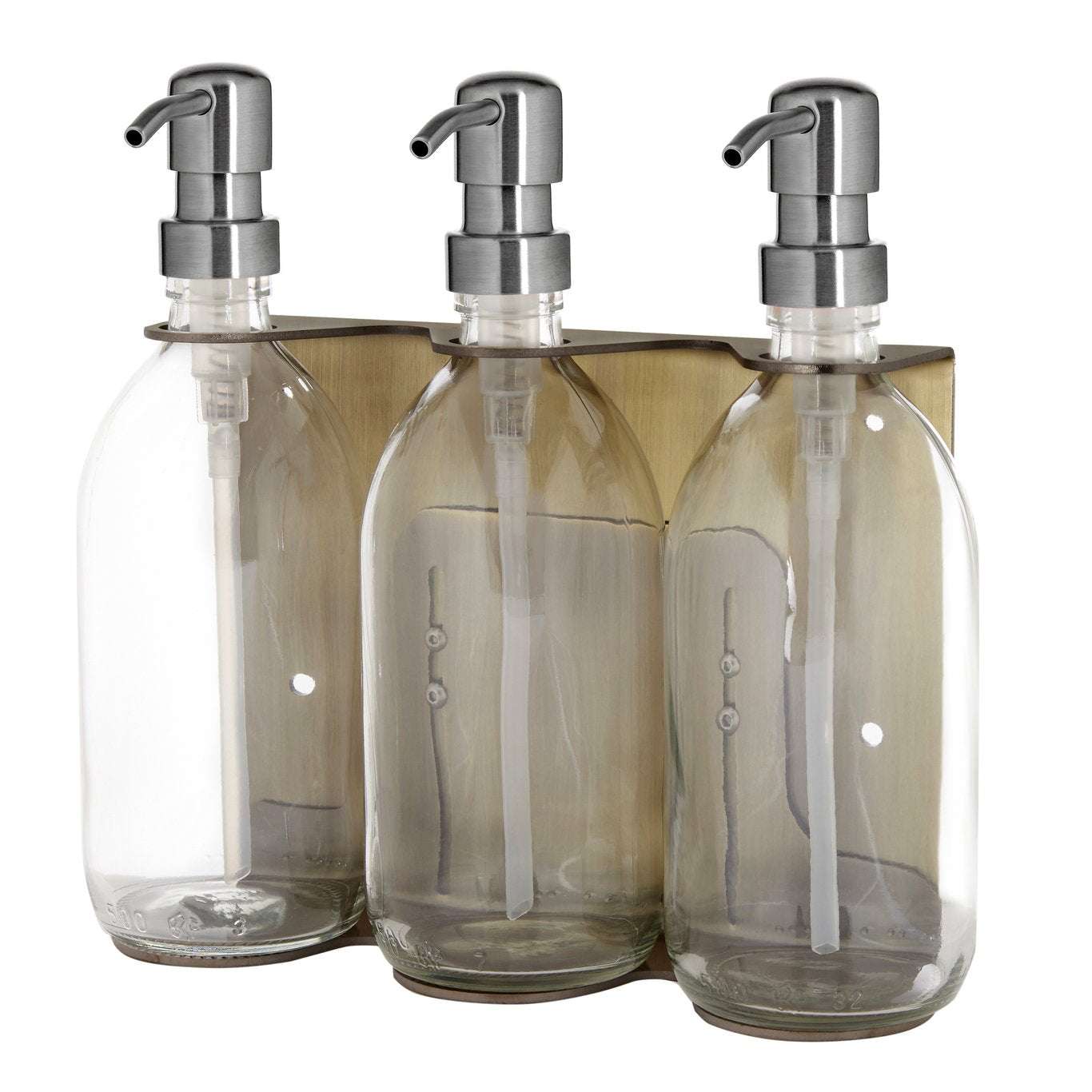 Triple distributeur de savon mural avec flacons verre transparent et pompe argentée.